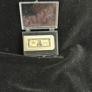 Gold tone money clip